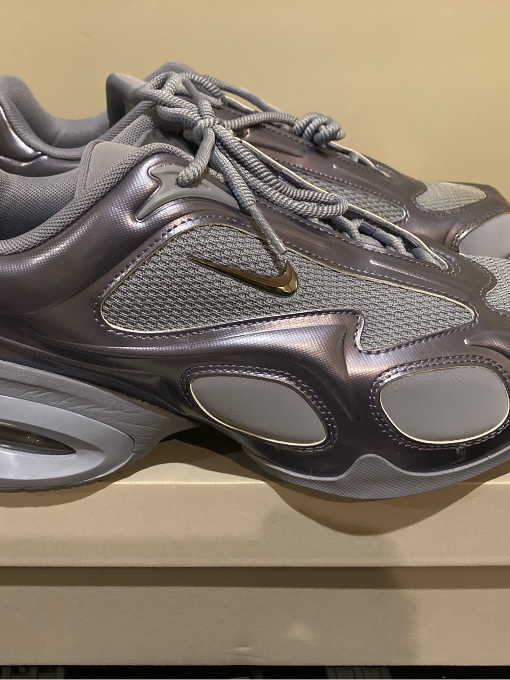 Nike Women’s Metallic Silver and Grey Runner Sneakers